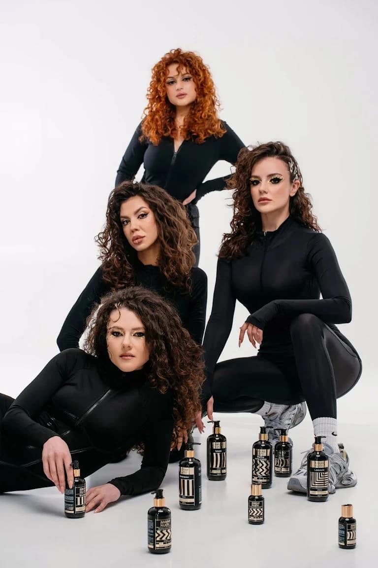 Four women with different curl types and the Make Kudri products